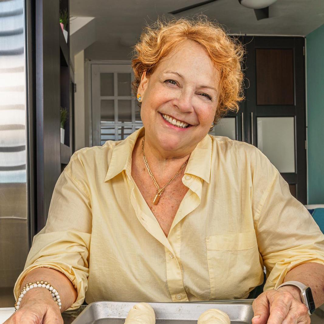 May be an image of 1 person and food