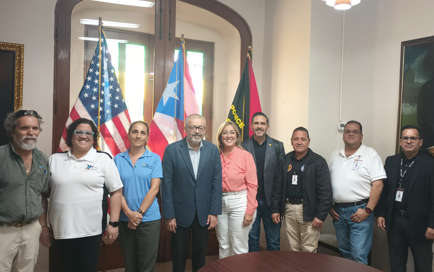 May be an image of 9 people and text